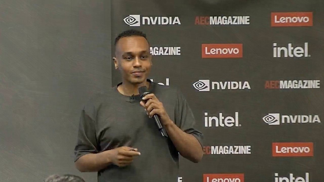 Mohamed Adil speaking on stage about Awatif